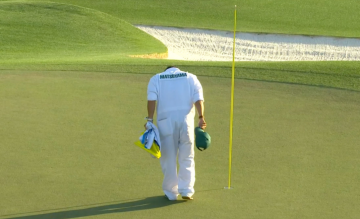 To show caddie taking a bow.