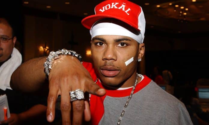 nelly standing in club